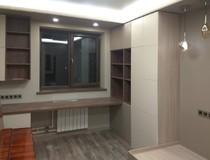 Шкафы, стол и кровать детской